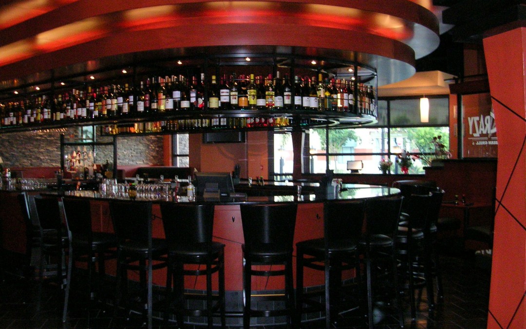 Custom round ceiling element suspended from structure